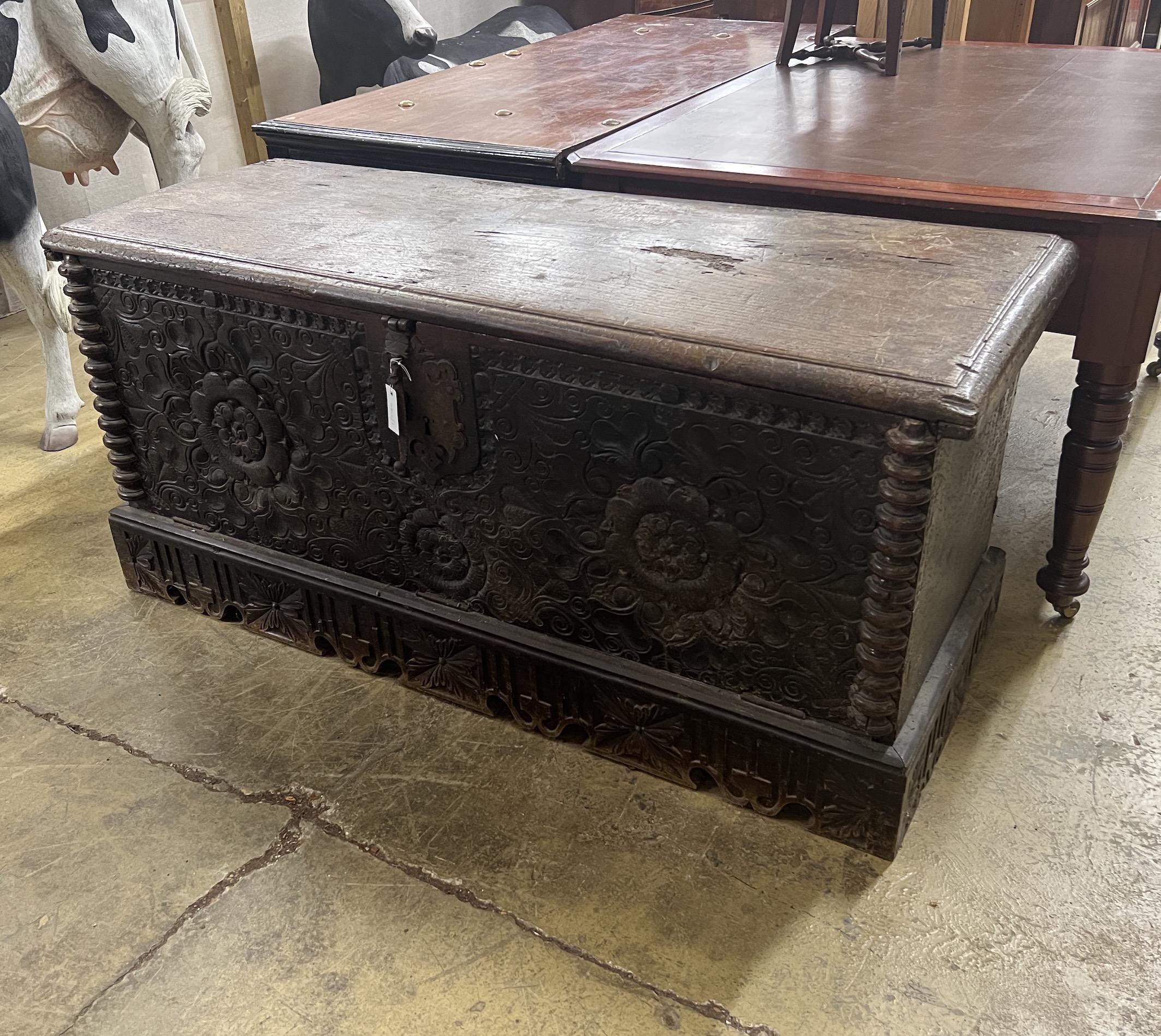 A large 17th century and later continental oak coffer (adapted), width 156cm, depth 58cm, height 72cm